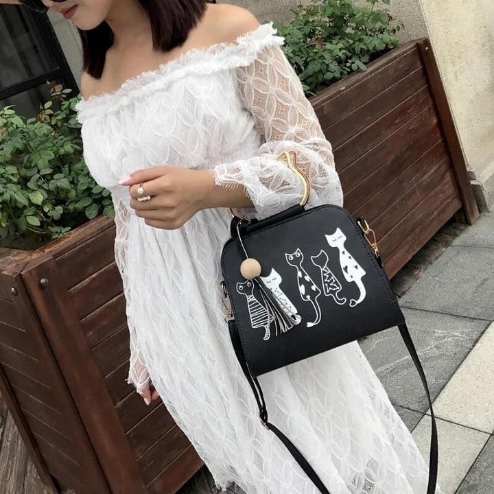 Isabella™ - Sac à main à sonalité ronronnante