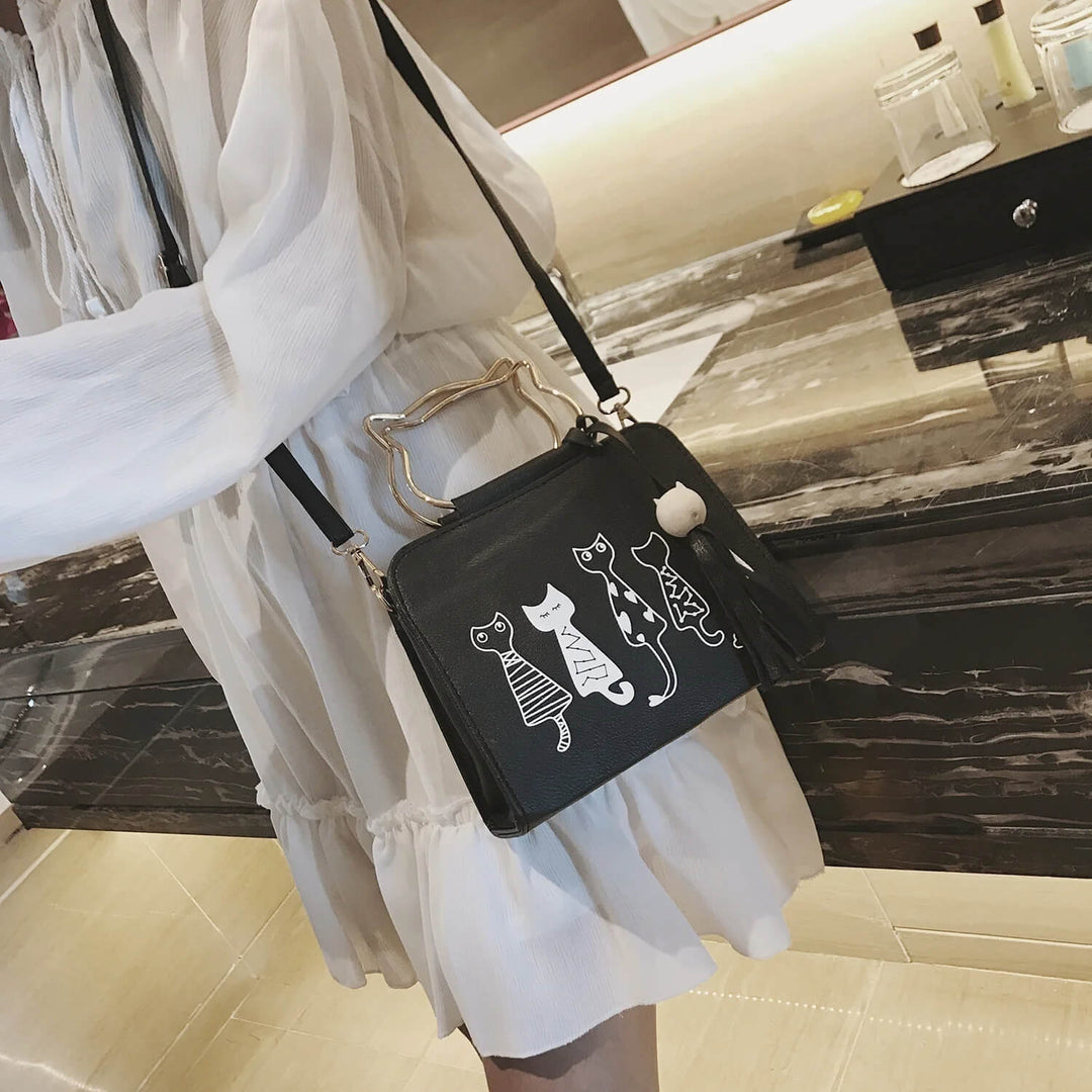Isabella™ - Sac à main à sonalité ronronnante