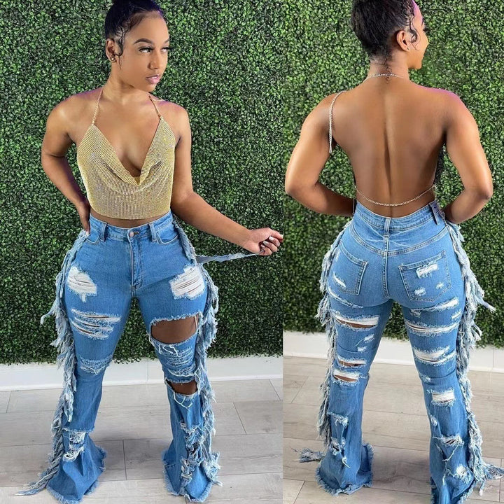 Europäische und amerikanische notleidende gewaschene Quaste Jeans - Modefluss